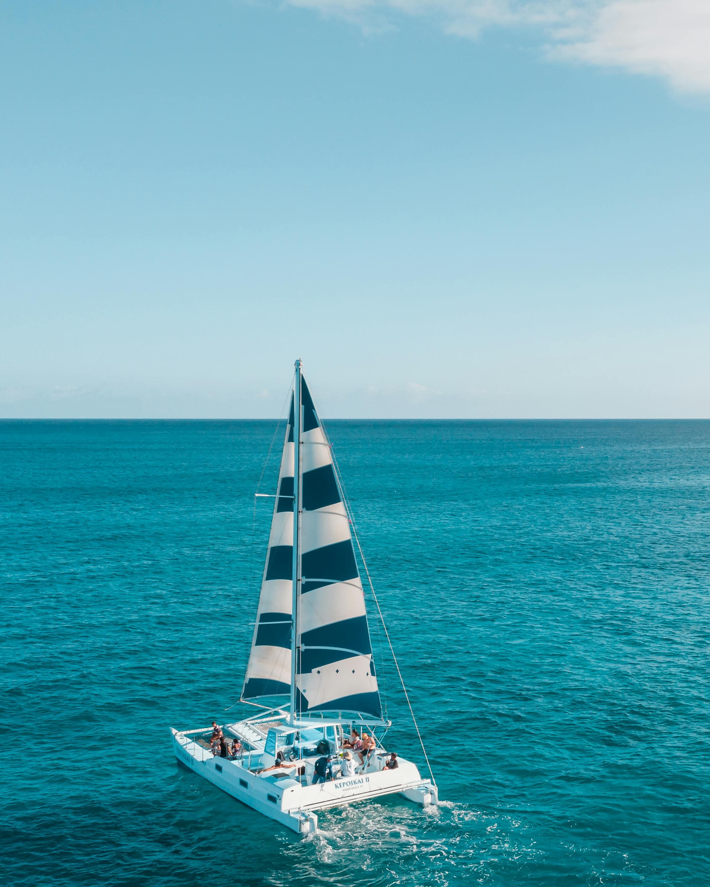 Luxury catamaran sailing in turquoise waters